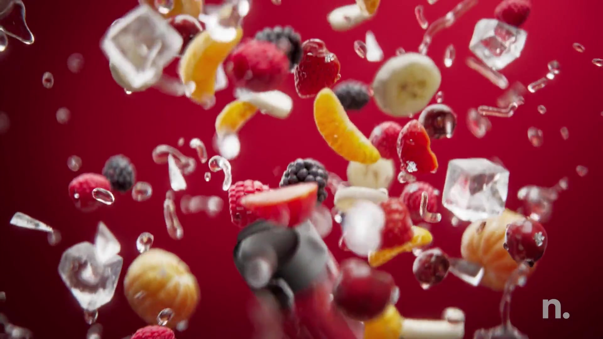 CGI fruit and ice exploding on red