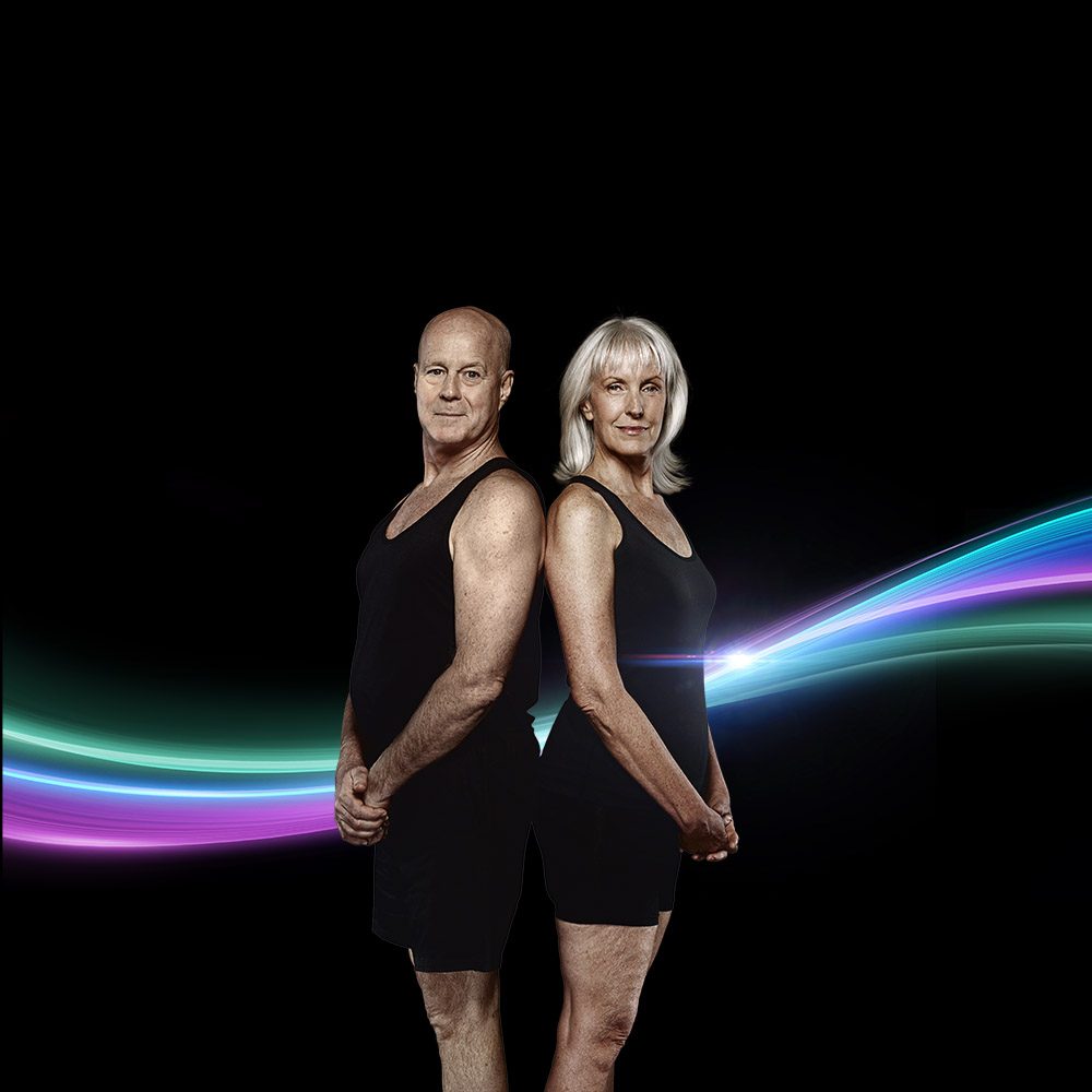 Picato Train: a couple standing back to back, wrapped in a light trail