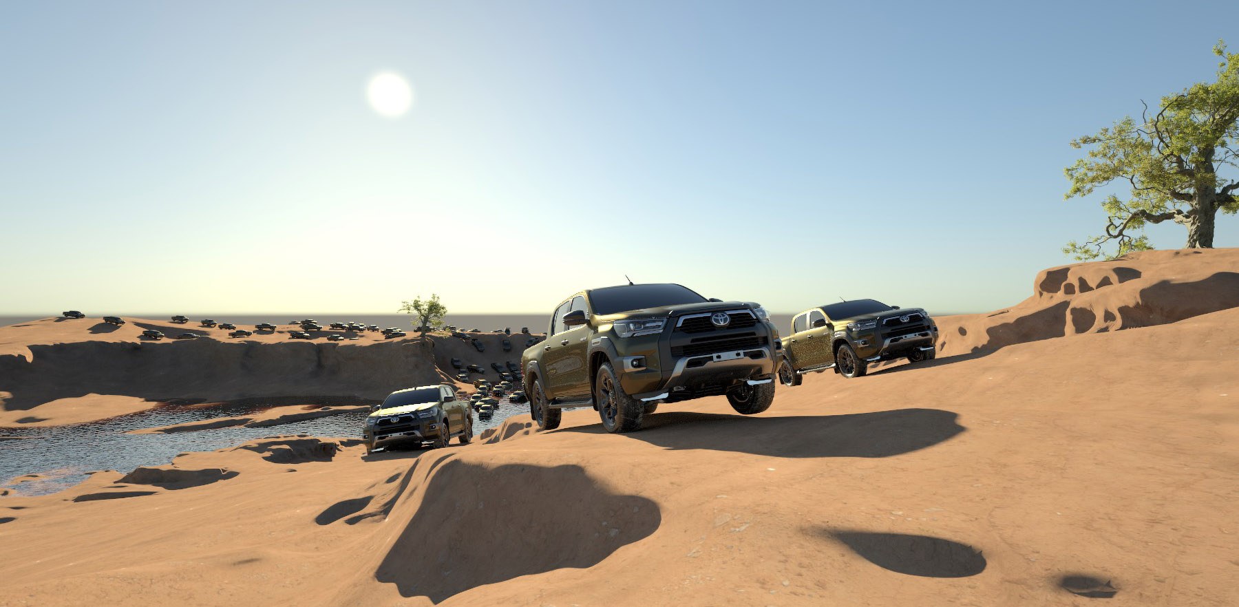 Early lighting test of Hilux trucks in the desert canyon