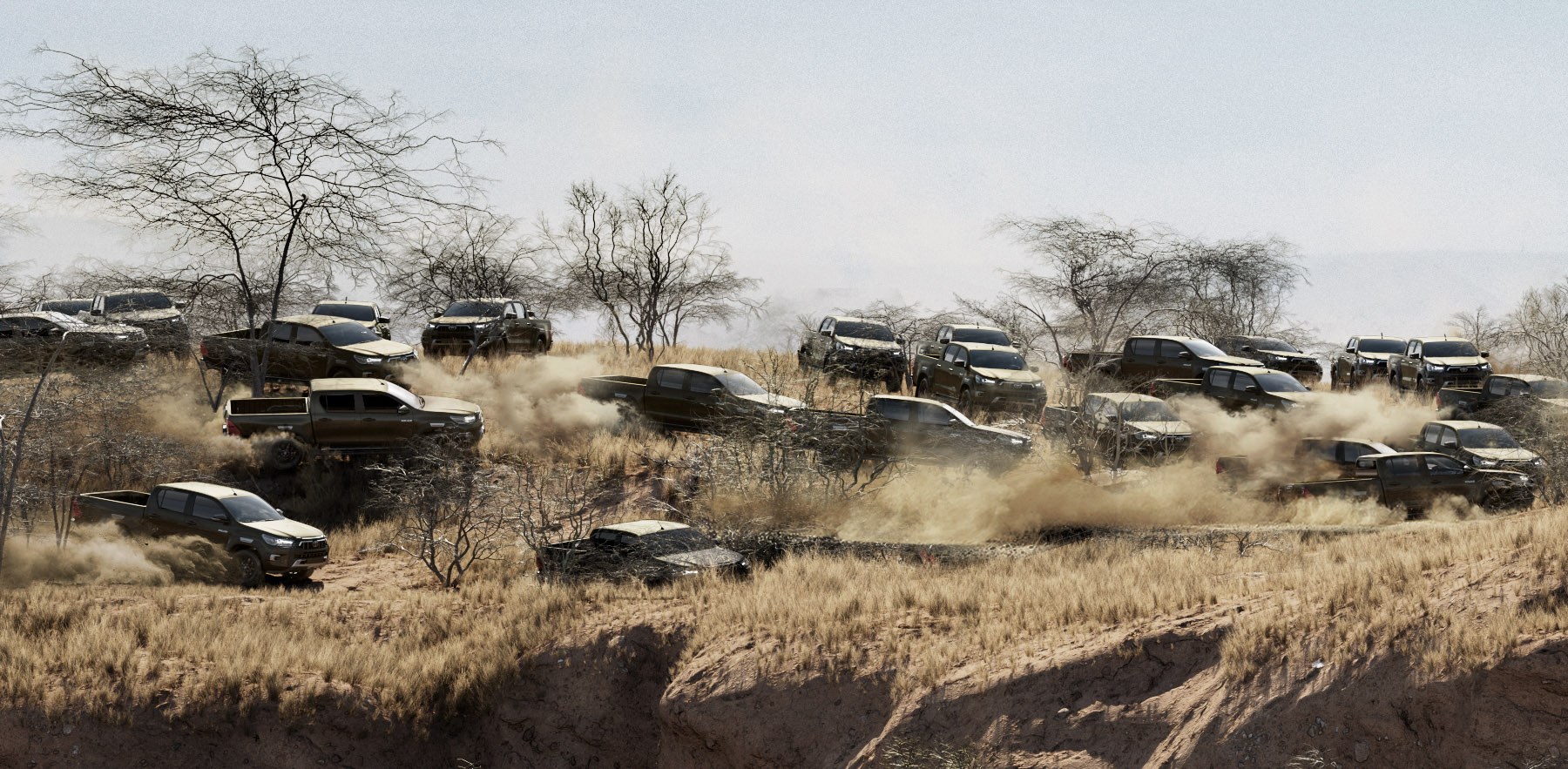 A stampede of Hilux trucks kicking up dust across the savannah