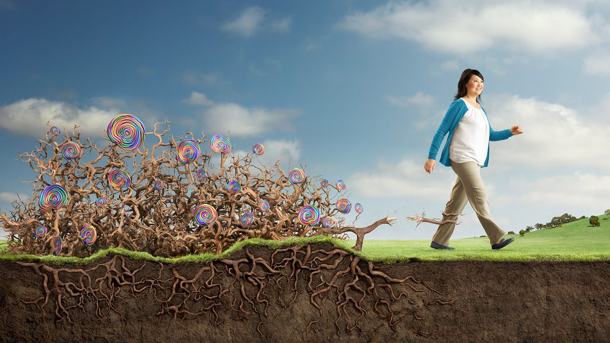 Victoza Roots: a woman walks away from the CGI roots and lollipops